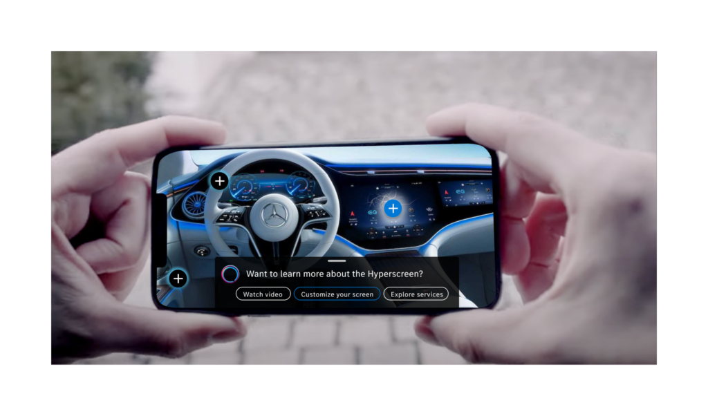 A person holding a smartphone horizontally with both hands, displaying an interactive advertisement or application on the screen.
