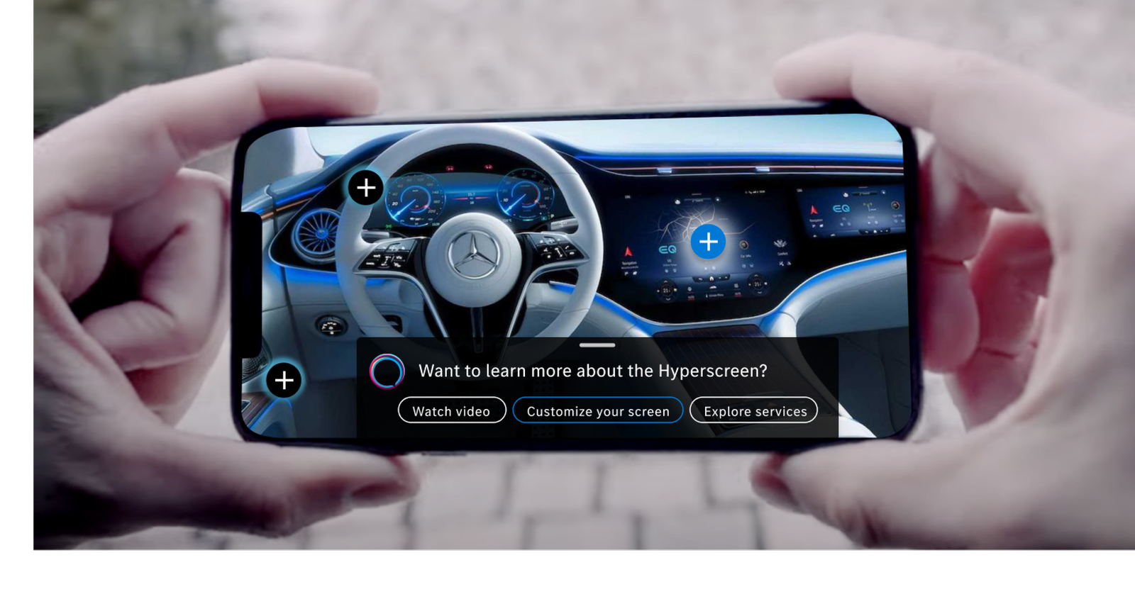 A person holding a smartphone horizontally with both hands, displaying an interactive advertisement or application on the screen.